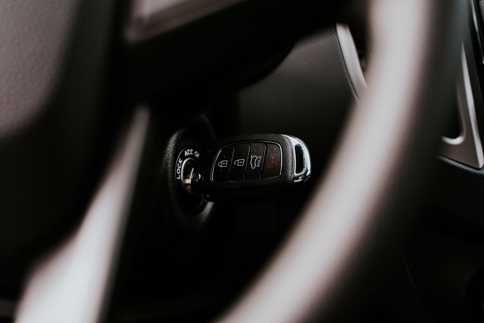 Car key replacement in Farmington, NM — a replacement key fob in the ignition, programmed at the vehicle by a mobile locksmith instead of a dealership tow